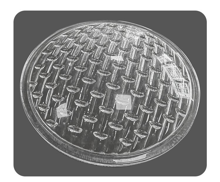 Round clear pressed prismatic glass lens cover with ribbed optical texture, replacement plate for industrial floodlights and stage lighting.