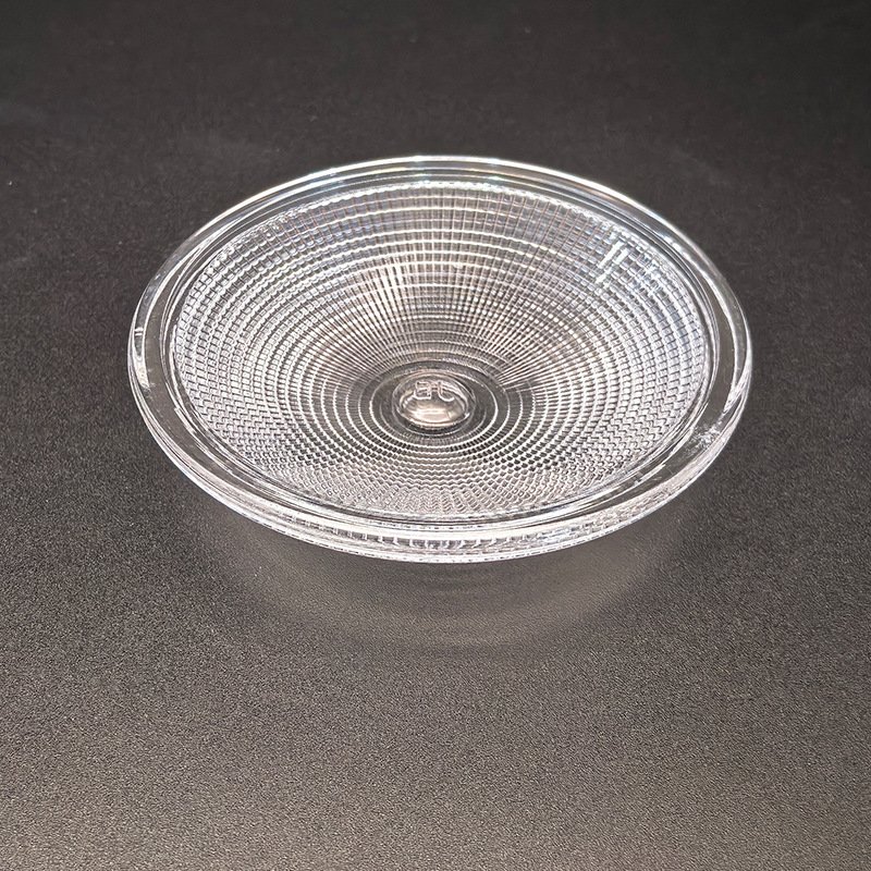 Clear round pressed glass chandelier bobeche dish with diamond cut pattern, central hole for lamp arm, decorative crystal glass component