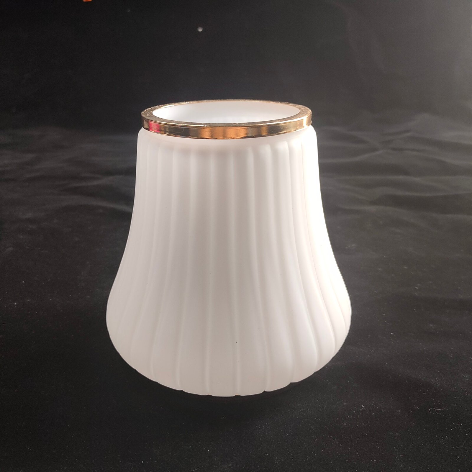 White frosted ribbed glass bell shade with decorative brass metal trim ring and spider fitter for pendant lights and chandeliers.